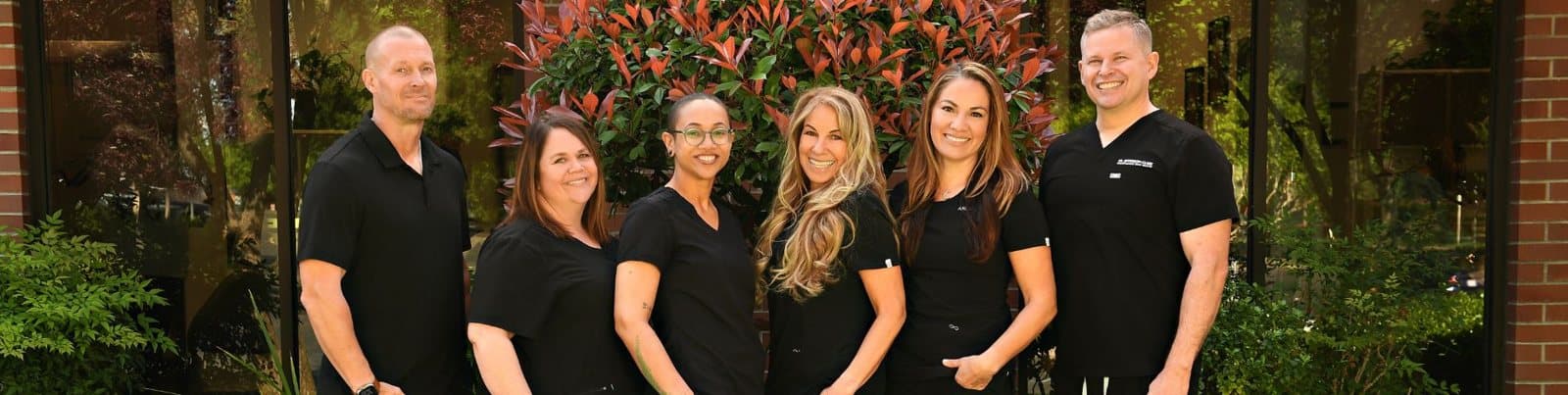 Dr. Jefferson Clark and his private-care dental team outside the Roseville practice